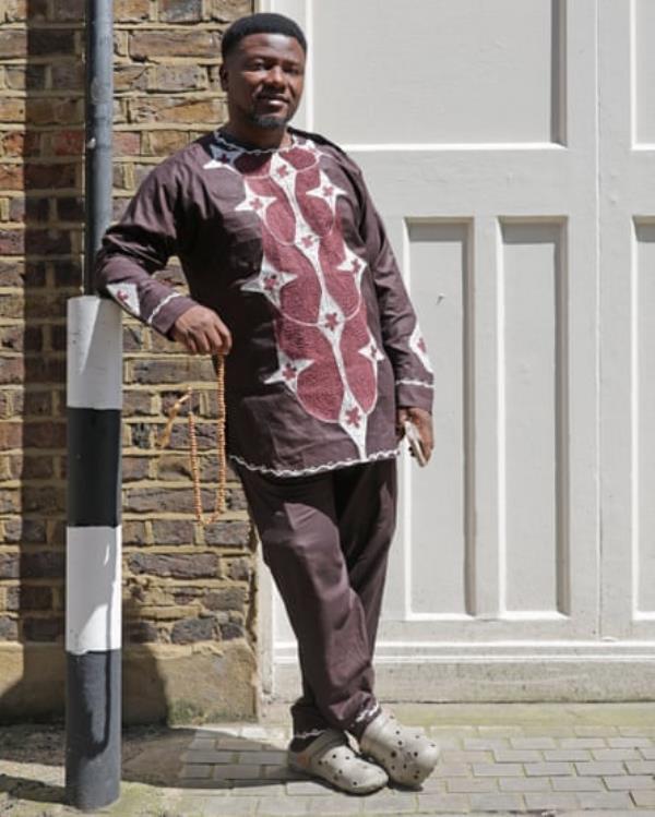 Musa, aged 41, wears a purple top.